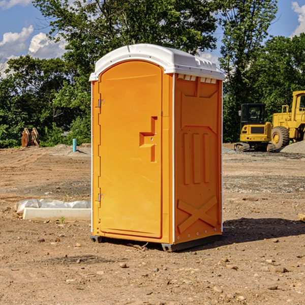 what is the cost difference between standard and deluxe portable toilet rentals in Portland Iowa